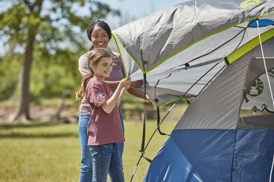 Cub Scouts setting up tent together