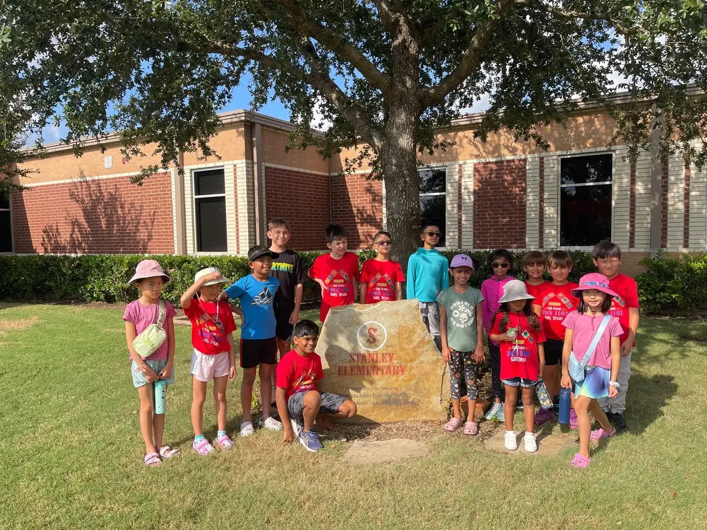 Pack 1103 scouts at Stan C. Stanley Elementary after a service project